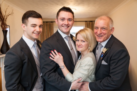 Groom with immediate family at home
